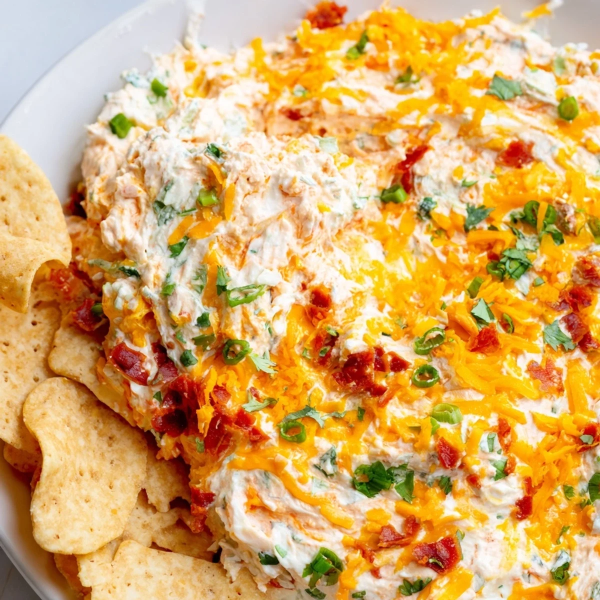 Delicious Boat Dip served with crunchy tortilla chips, ideal for game day gatherings.  