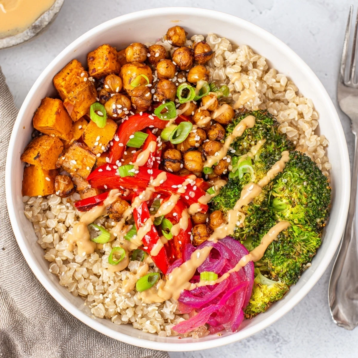 Vibrant Bold Sauce Drizzle Bowls topped with roasted vegetables and flavorful miso-butter sauce.  