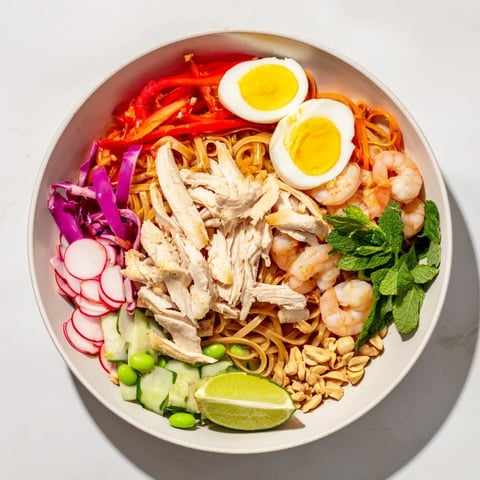 Vibrant Asian Fusion Noodle Bowl board showcases noodles, colorful veggies, and dipping sauces perfect for sharing.
