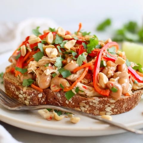 Homemade Thai Peanut Pinto Chicken Toast: A savory, colorful dish ready for lunch.