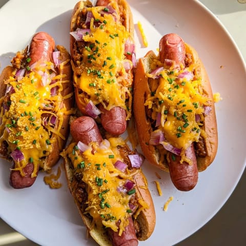 Cheesy Chili Dog Casserole, baked until golden and bubbly, perfect for a cozy weeknight dinner.