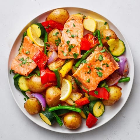 This easy salmon & potato skillet features flaky fish and tender, roasted vegetables.