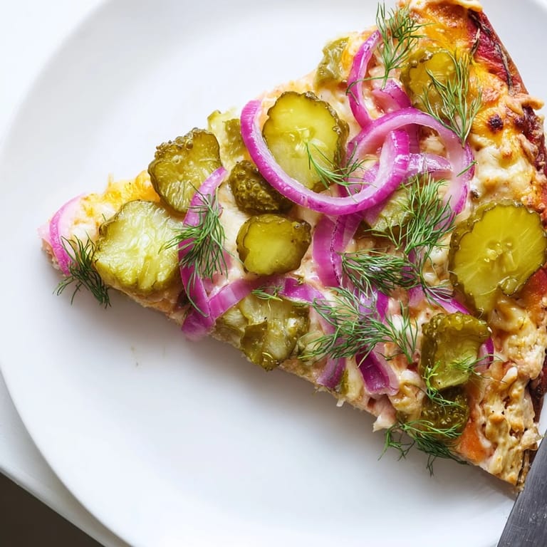 A deliciously unique Pickle Pizza, perfect for adventurous food lovers to try.