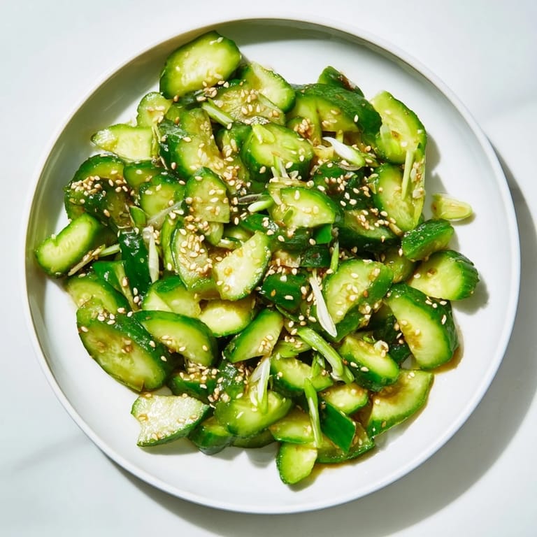 This quick and easy Cucumber Shaker recipe showcases tangy rice vinegar and savory umami flavors.