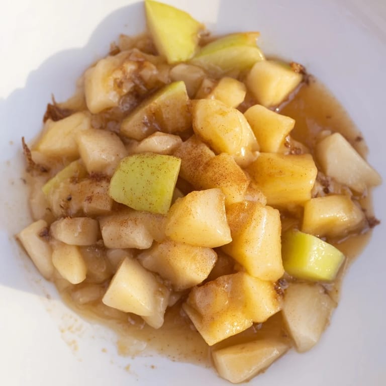 Golden, tender slow cooker stewed apples, a naturally sweet and comforting breakfast or dessert.